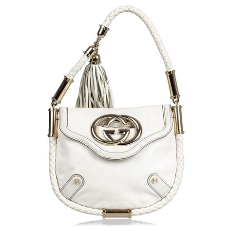 gucci handbag cream|Gucci bag with tassel.